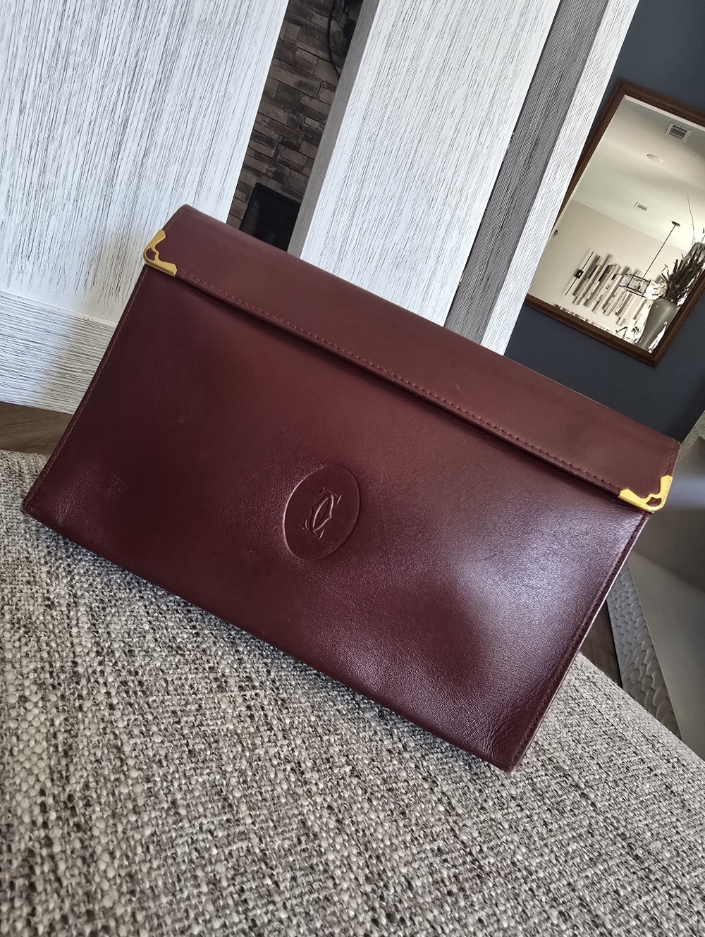 Cartier Wine Red Leather Envelope Pouch with Gold Corner Accents
